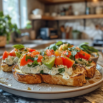 Savory healthy French toast topped with herbed ricotta and fresh chopped tomatoes